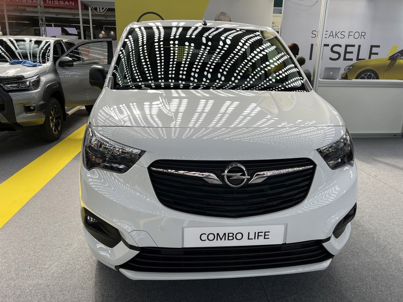 Front grille and headlights of a white van