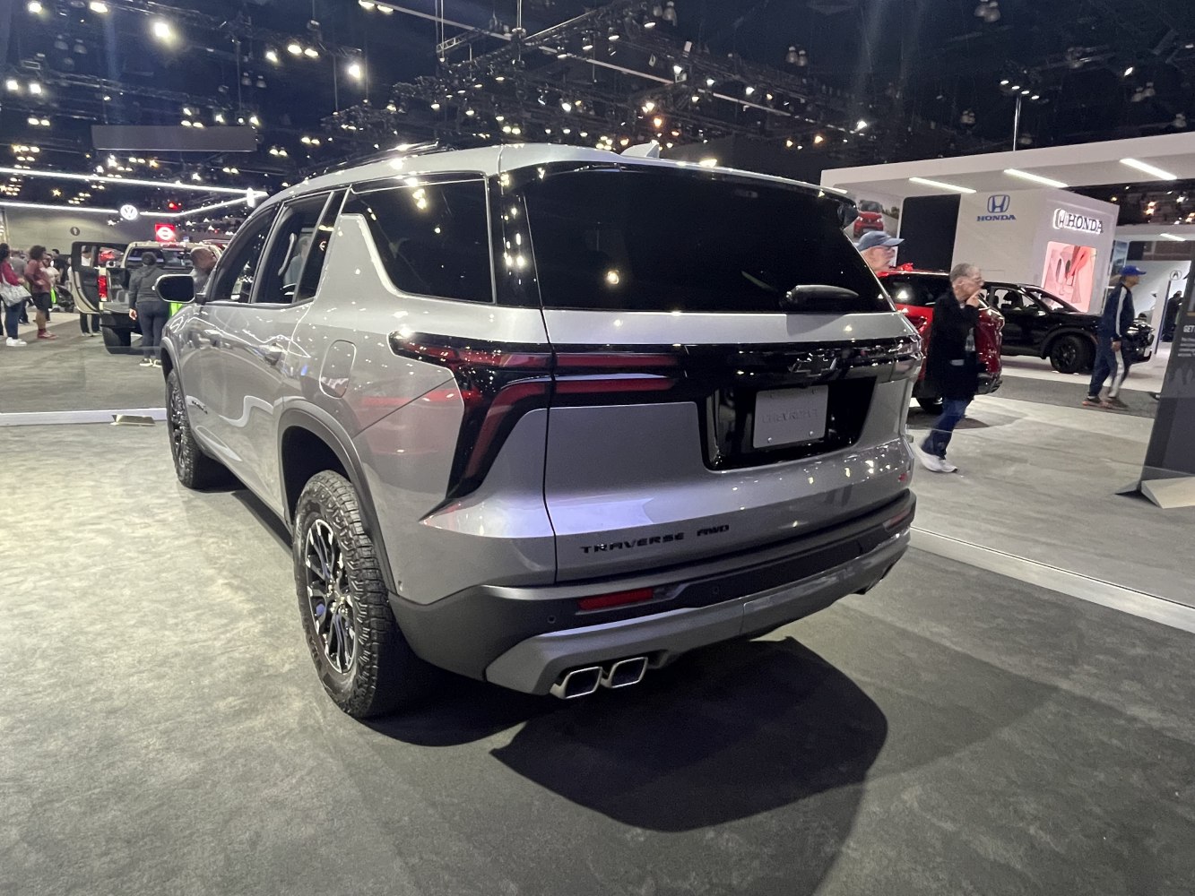 Rear view of modern SUV with distinctive taillights and quad exhaust tips
