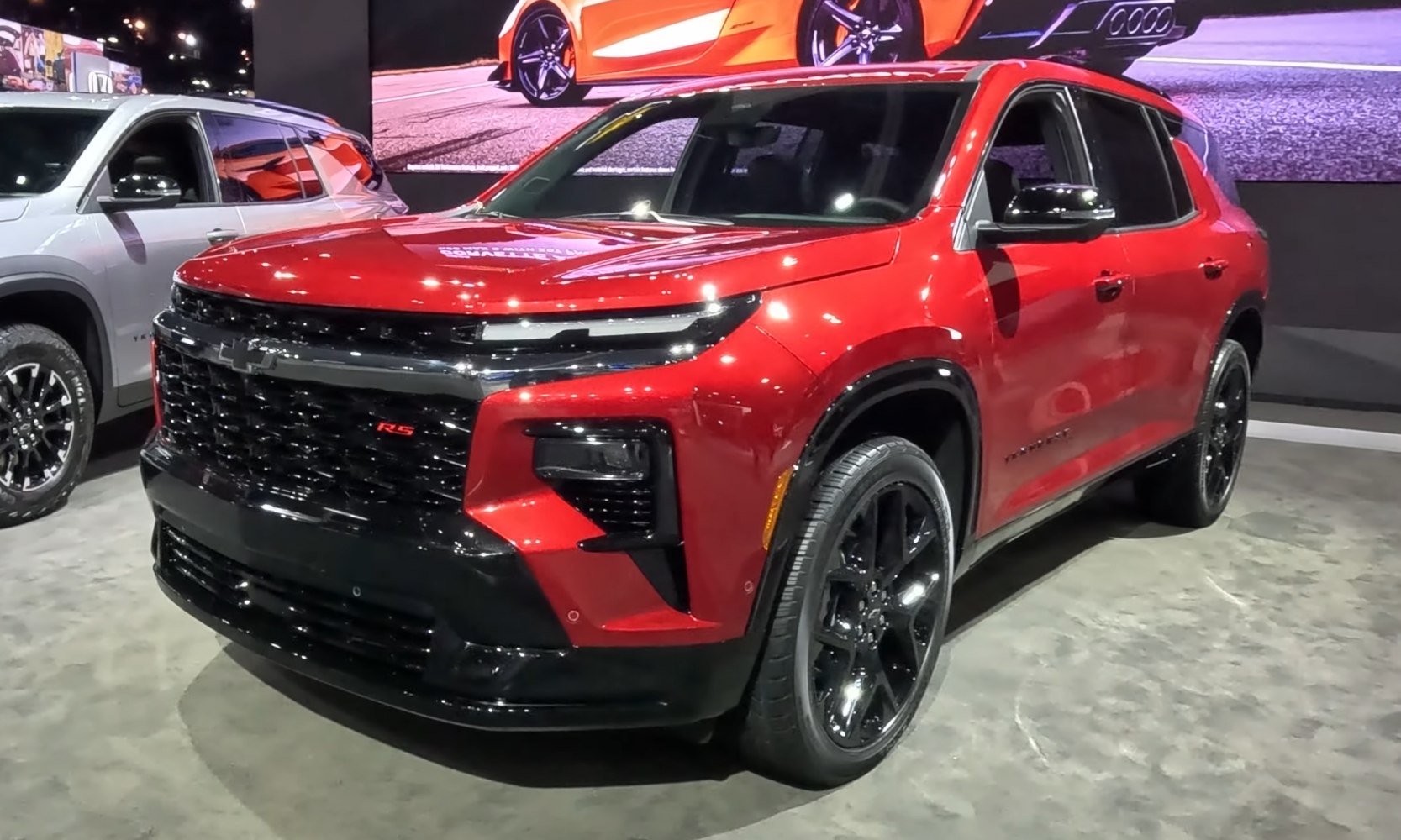 Front-side view of SUV with black grille and LED daytime running lights