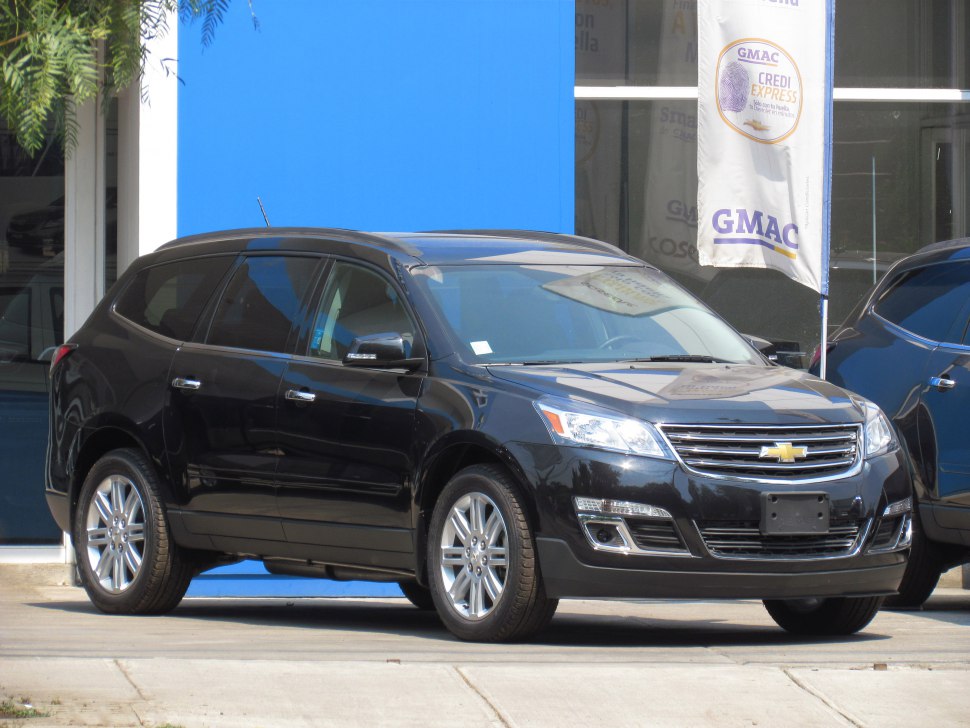 Front side view of a black SUV with a modern grille and alloy wheels.