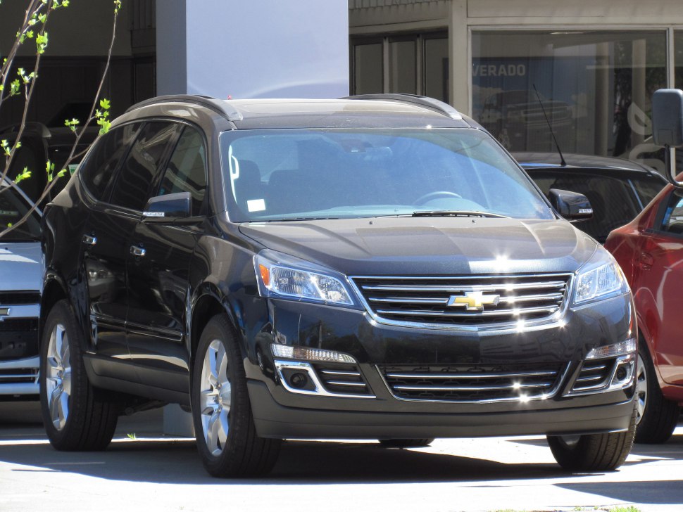 Front view of black SUV with chrome grille and modern headlights