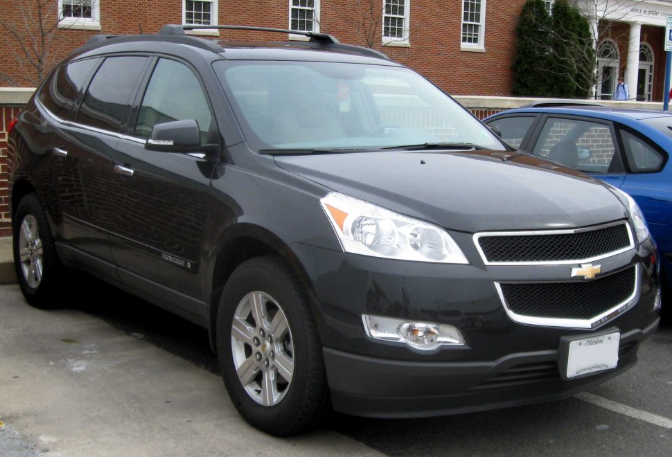 Front side view with bold grille and sleek windows