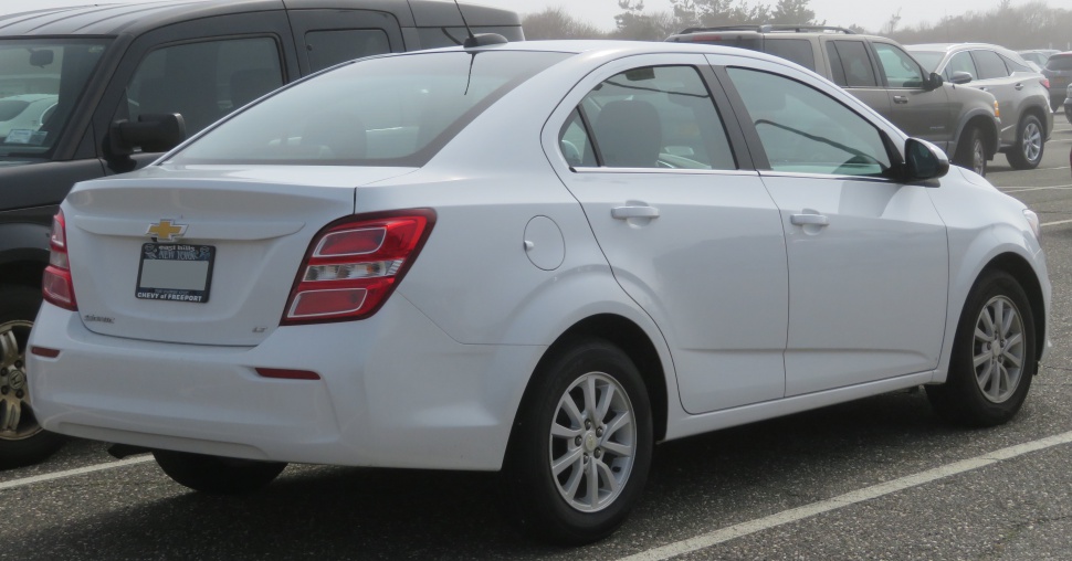 Rear and side view of a facelifted compact sedan with distinctive taillights.