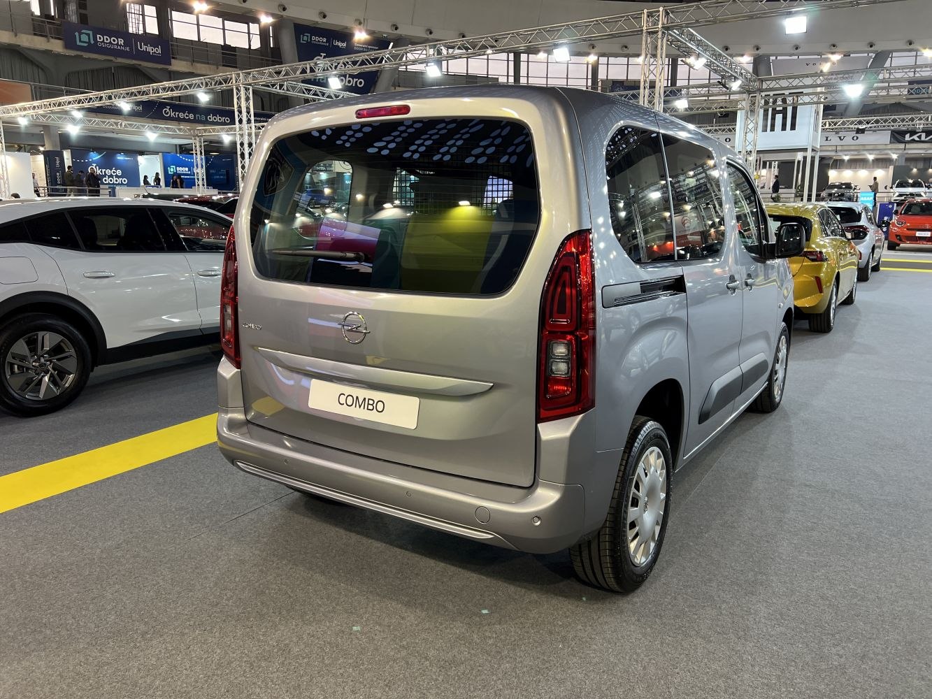 Rear view with large window and sliding side door of a multipurpose vehicle.
