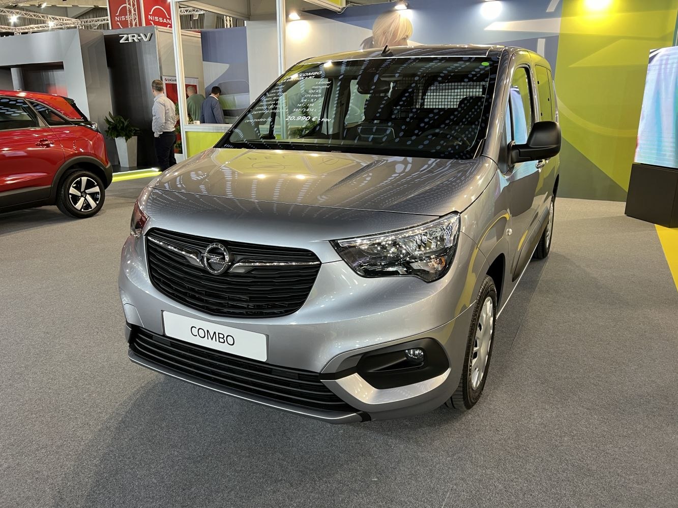 Front view of a modern van with bold grille and headlights