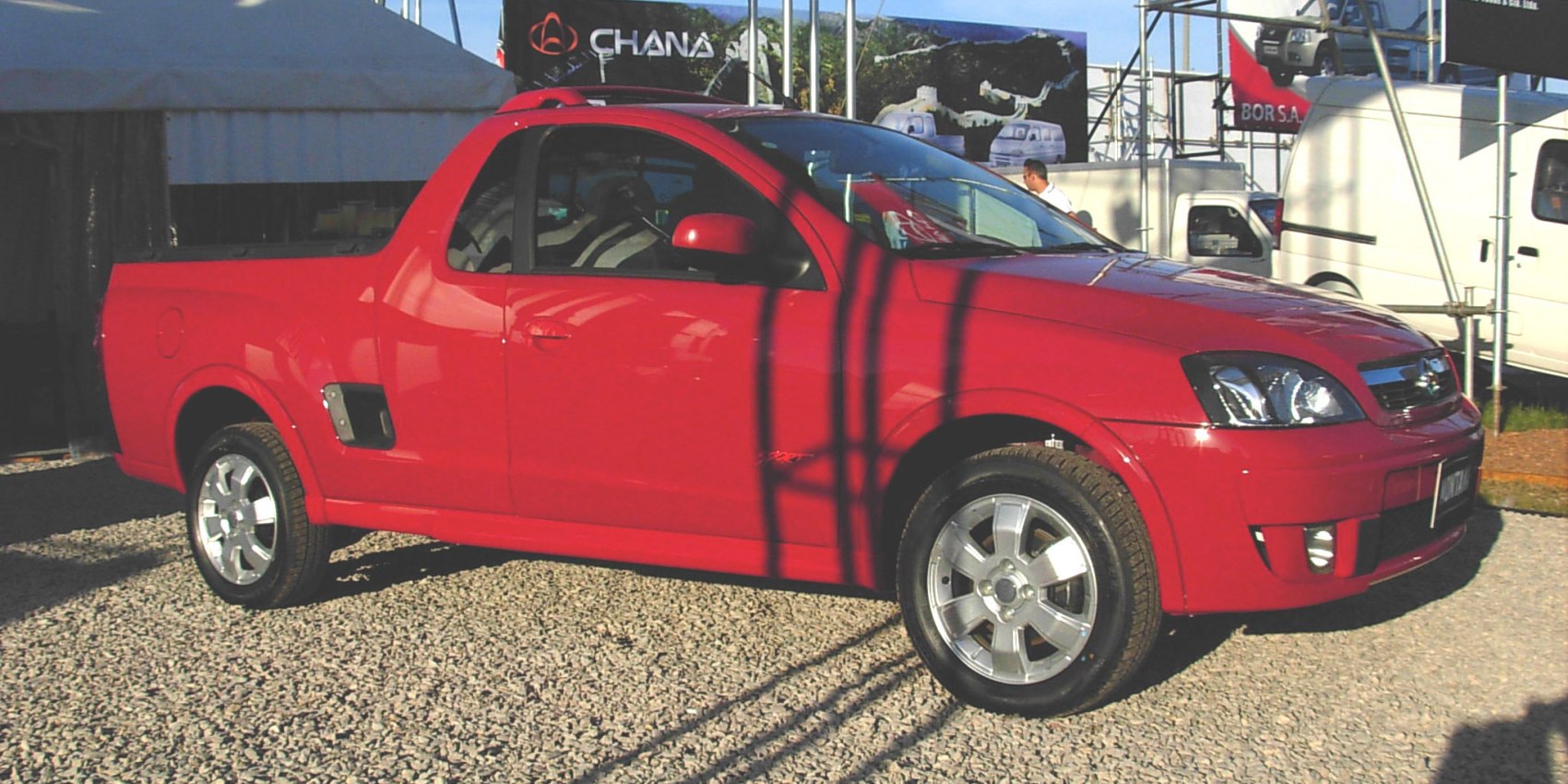 Side profile of compact sport-style pickup truck with alloy wheels