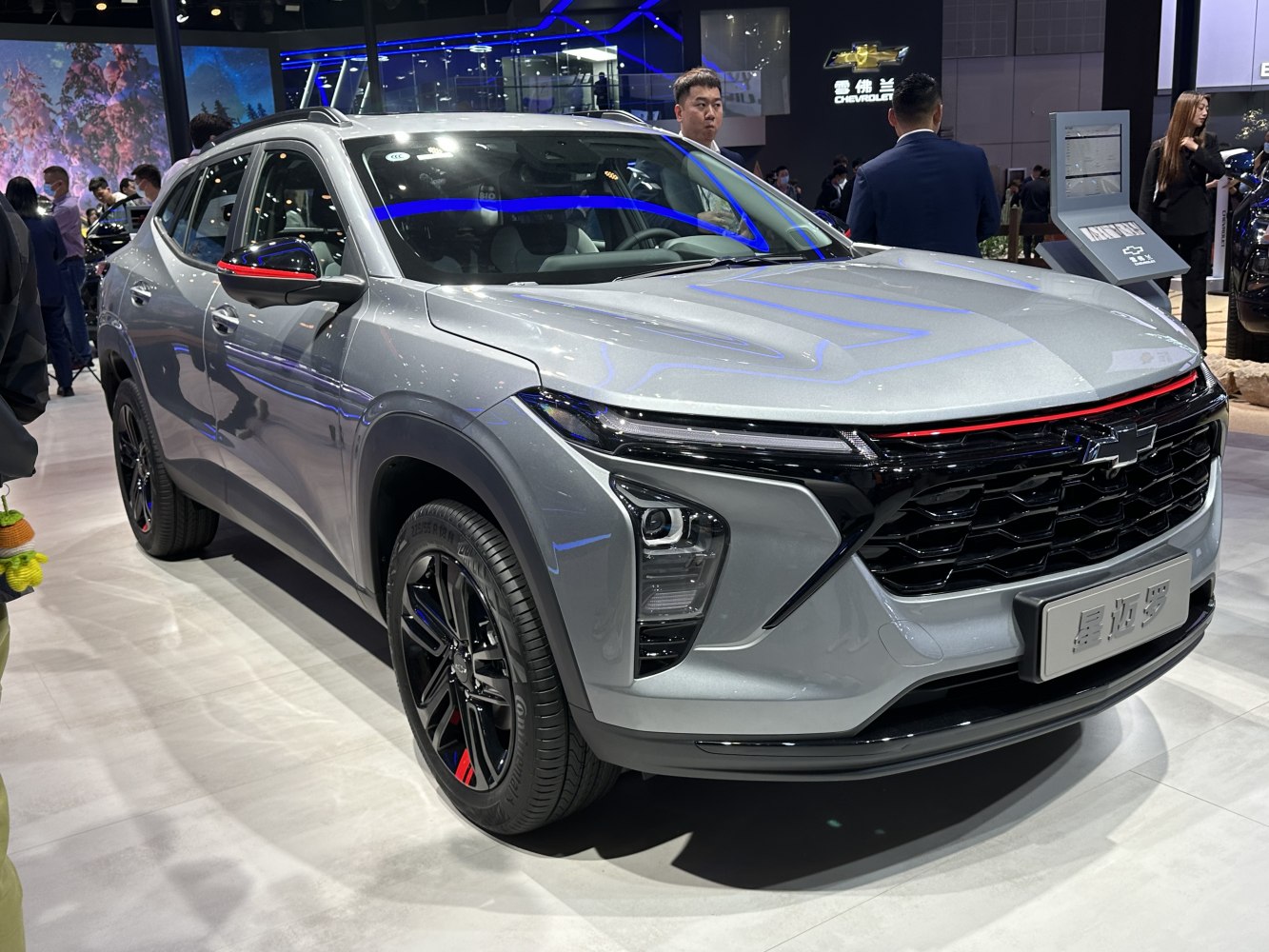 Front view of SUV with sharp LED headlights and black grille