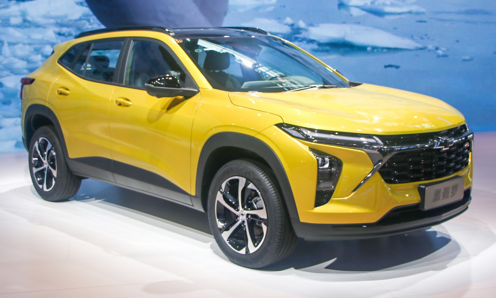 Yellow SUV with black accents and distinct headlights