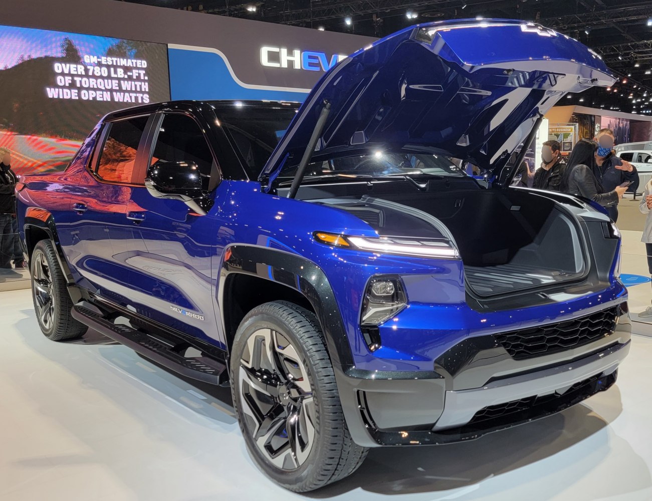 Electric pickup with open front trunk and sleek headlights
