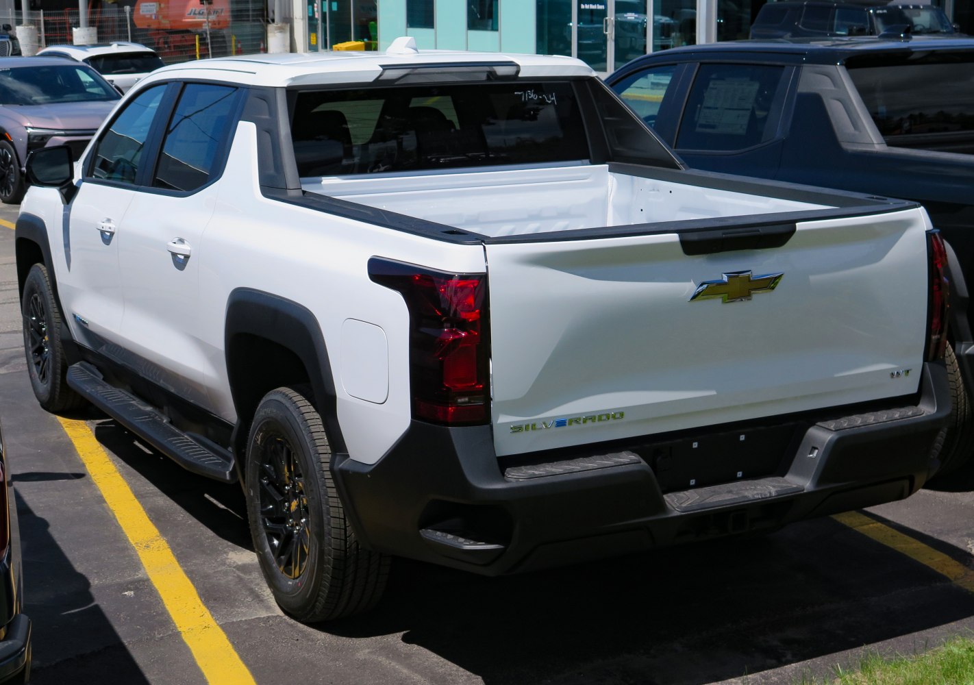 Rear bed, tailgate, and taillights of a modern crew cab pickup