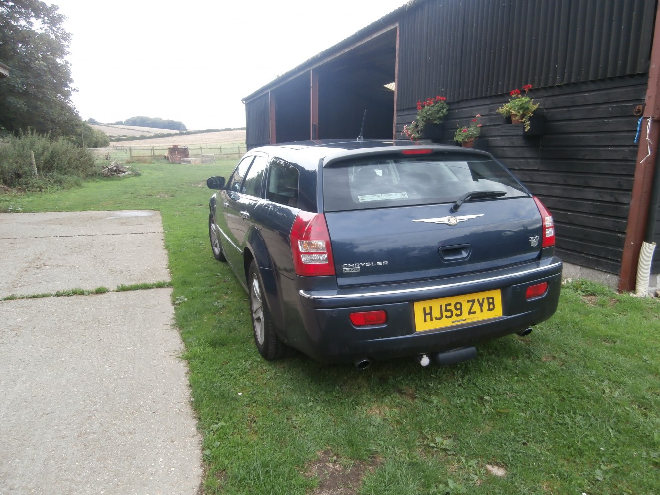 Rear view of a station wagon with distinctive taillights and hatchback design