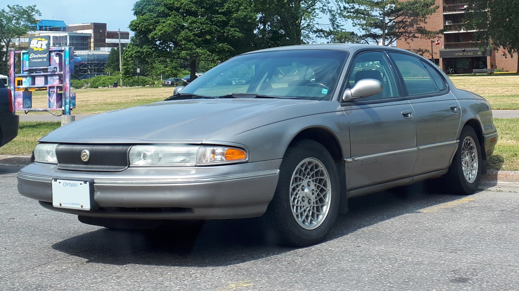 Classic 1990s sedan with unique front grille and mesh alloy wheels