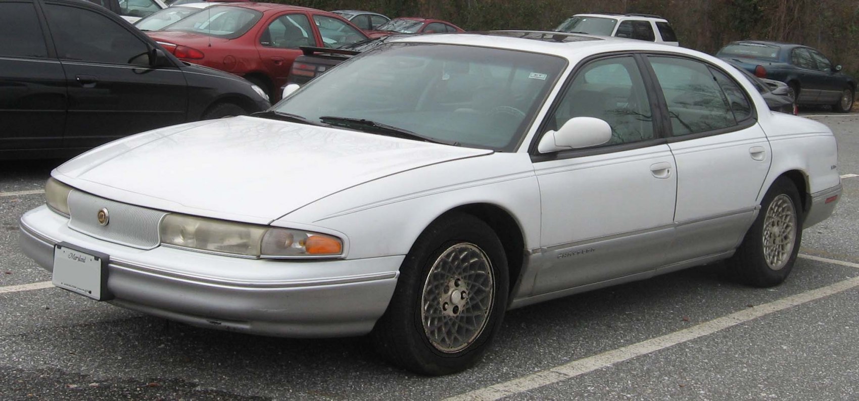 1990s sedan with distinctive front grille and mesh alloy wheels