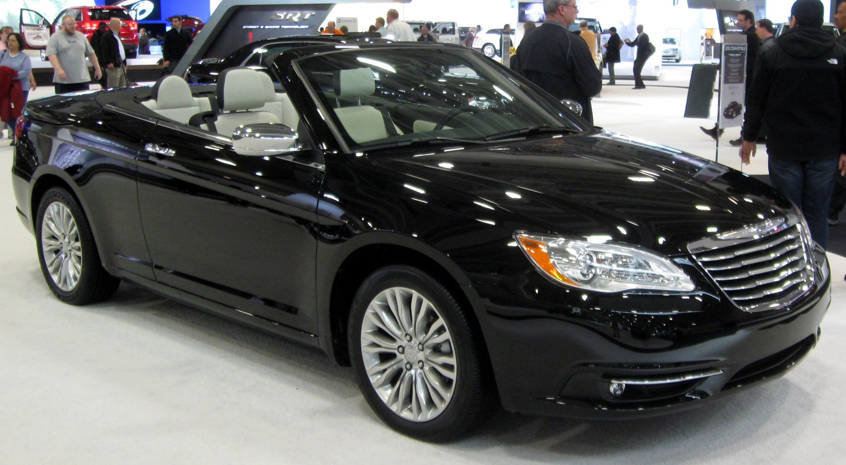 Black convertible with chrome grille and alloy wheels