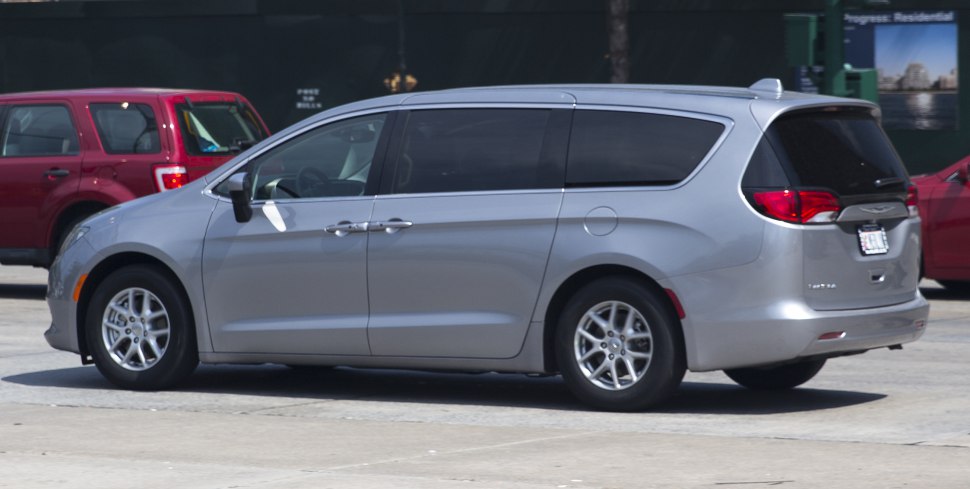 Silver minivan with side profile and tinted rear windows