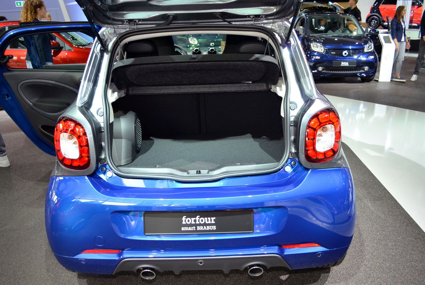 Open rear trunk with spacious cargo area and distinctive taillights