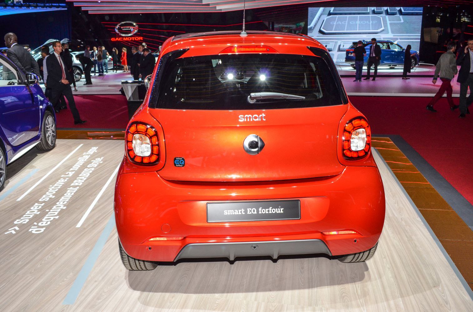 Compact hatchback rear view with unique taillight design and rear window wiper