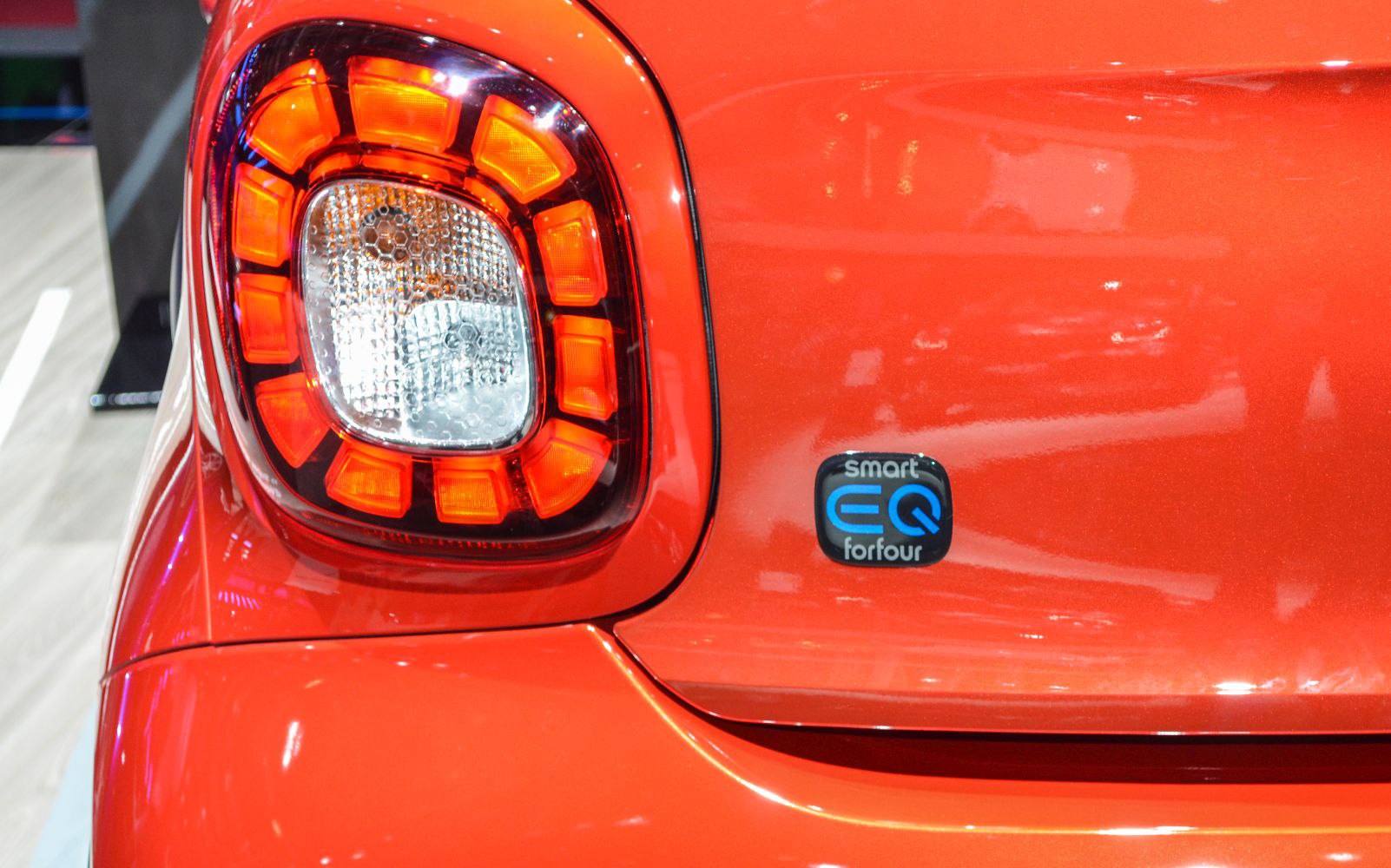 Close-up of rear tail light and electric EQ badge