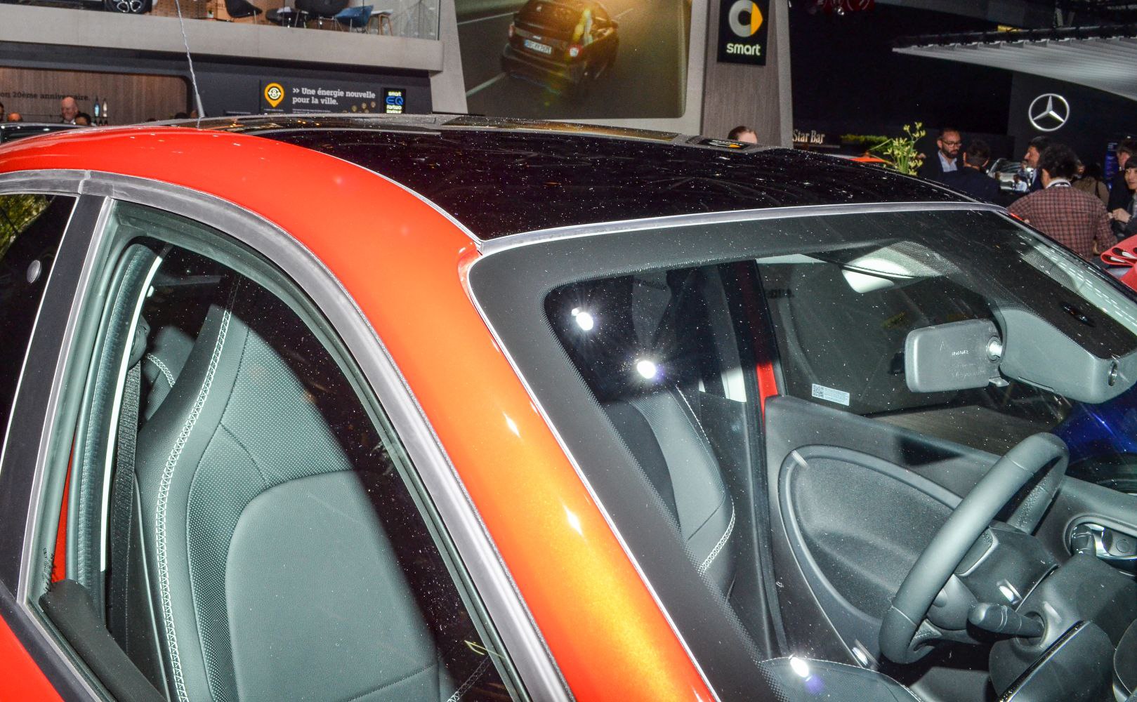 Panoramic roof and detailed interior seats with steering wheel