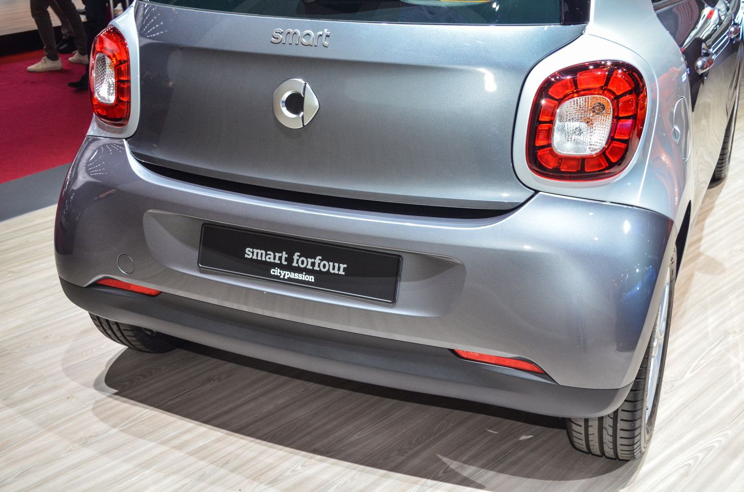 Rear view with distinctive taillight and Smart emblem.