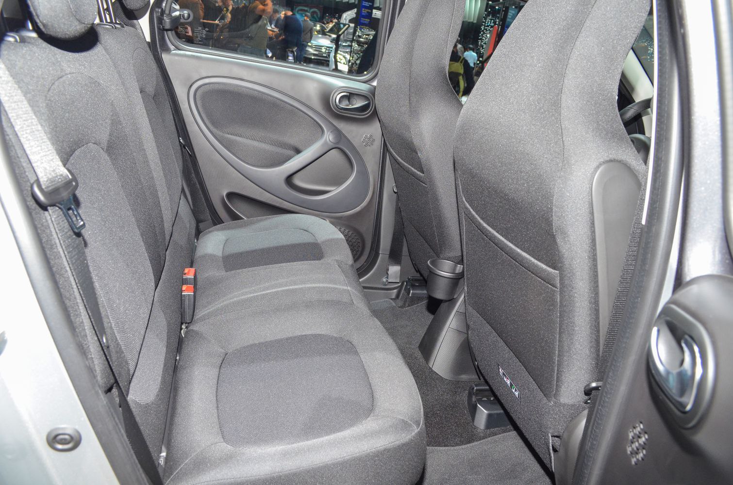 Rear seating area with fabric upholstery and door panel design