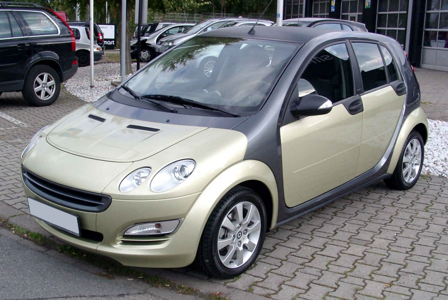 Compact hatchback with two-tone body and rounded headlights