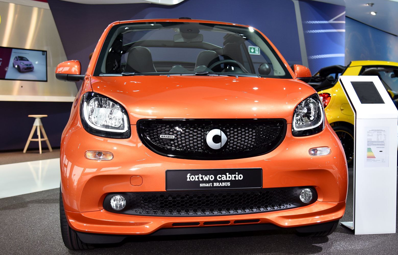 Compact front grille and headlights of a small convertible.