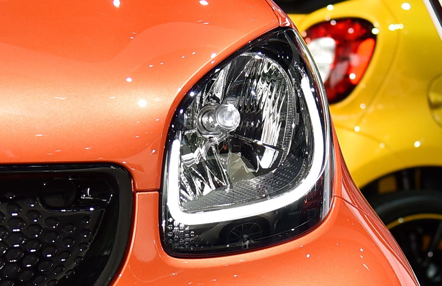 Close-up of Smart Fortwo III Cabrio front headlight with modern lighting design