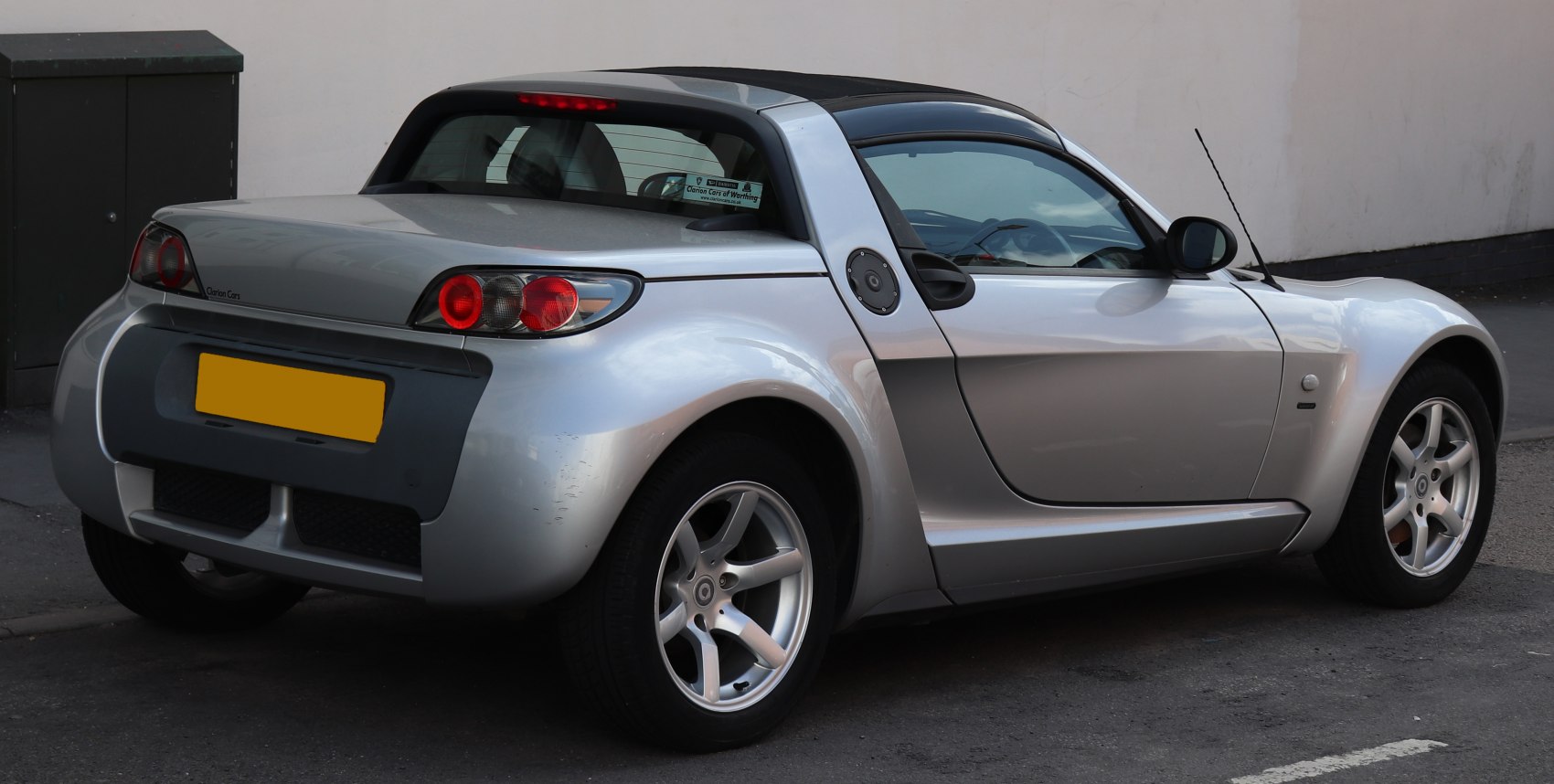 Rear side small sports coupe with distinct rear lights