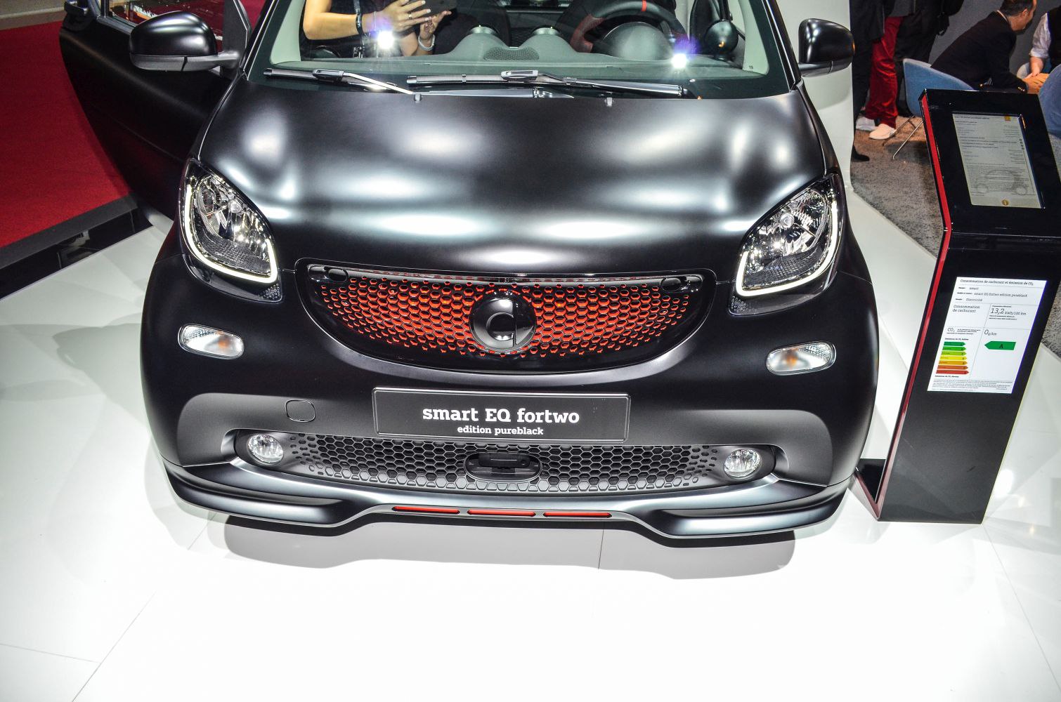 Front view with distinctive grille and headlights