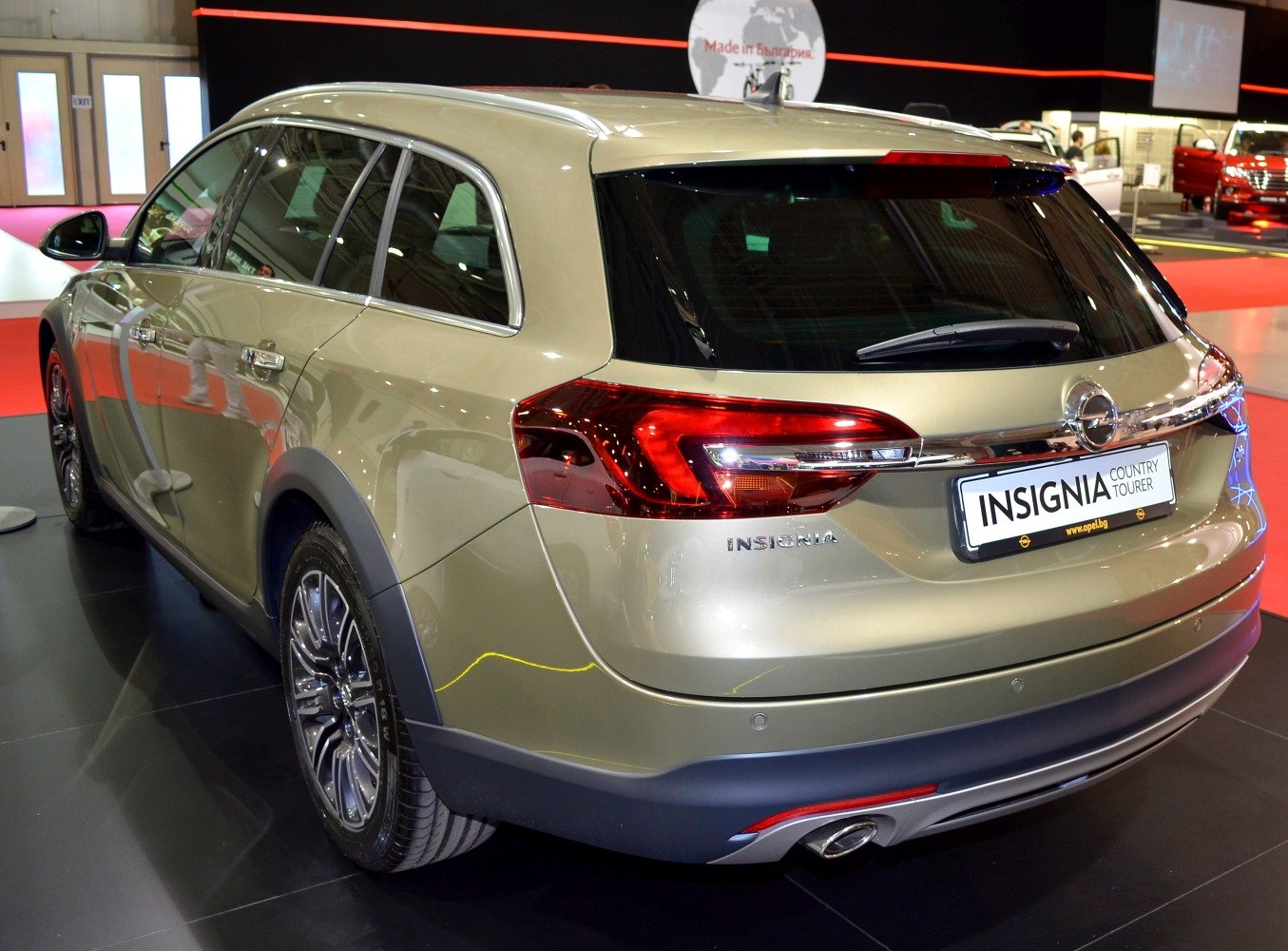 Rear side view of a wagon with distinctive taillights and dual exhaust