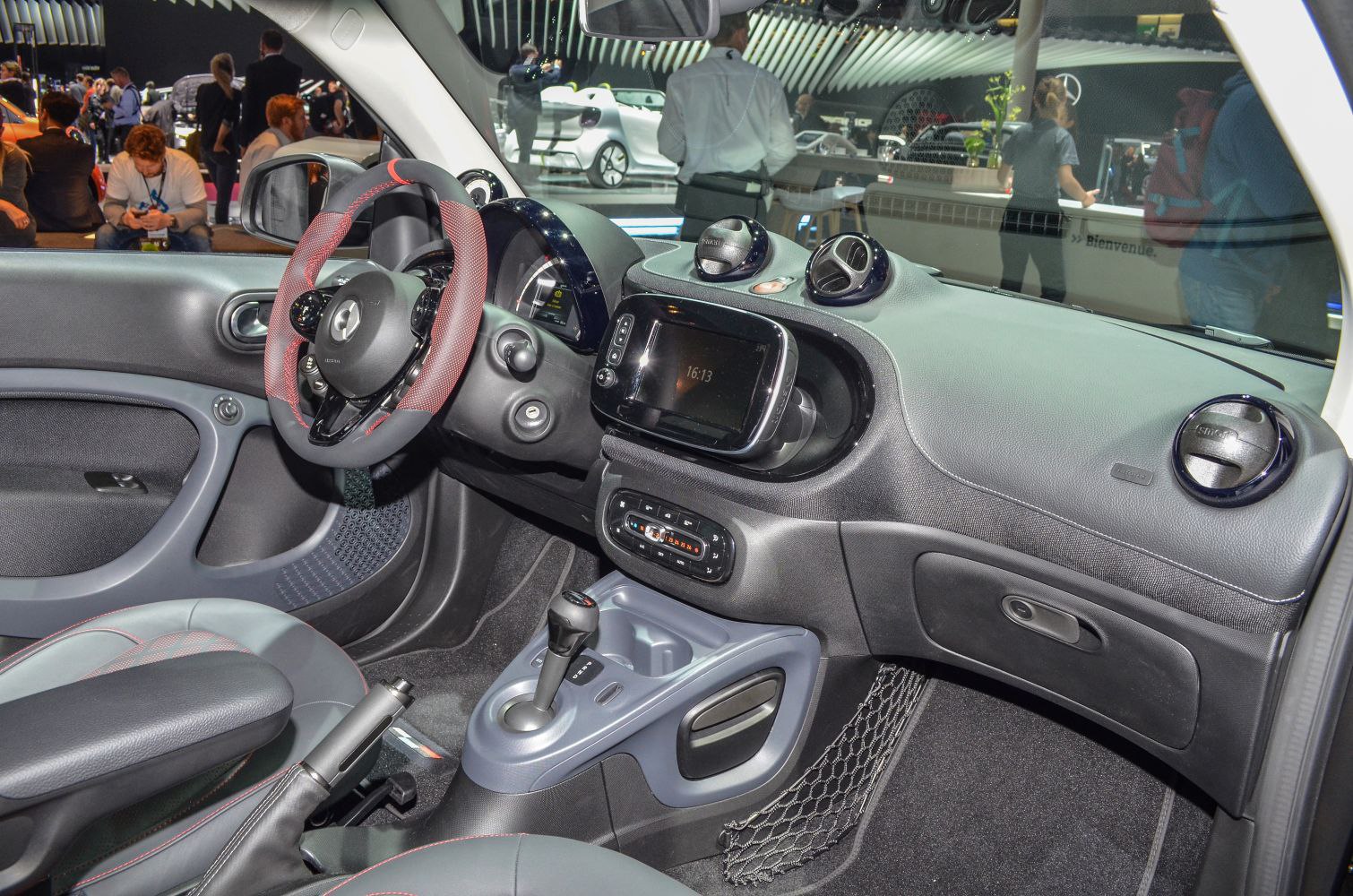 Dashboard and steering wheel with touchscreen and air vents