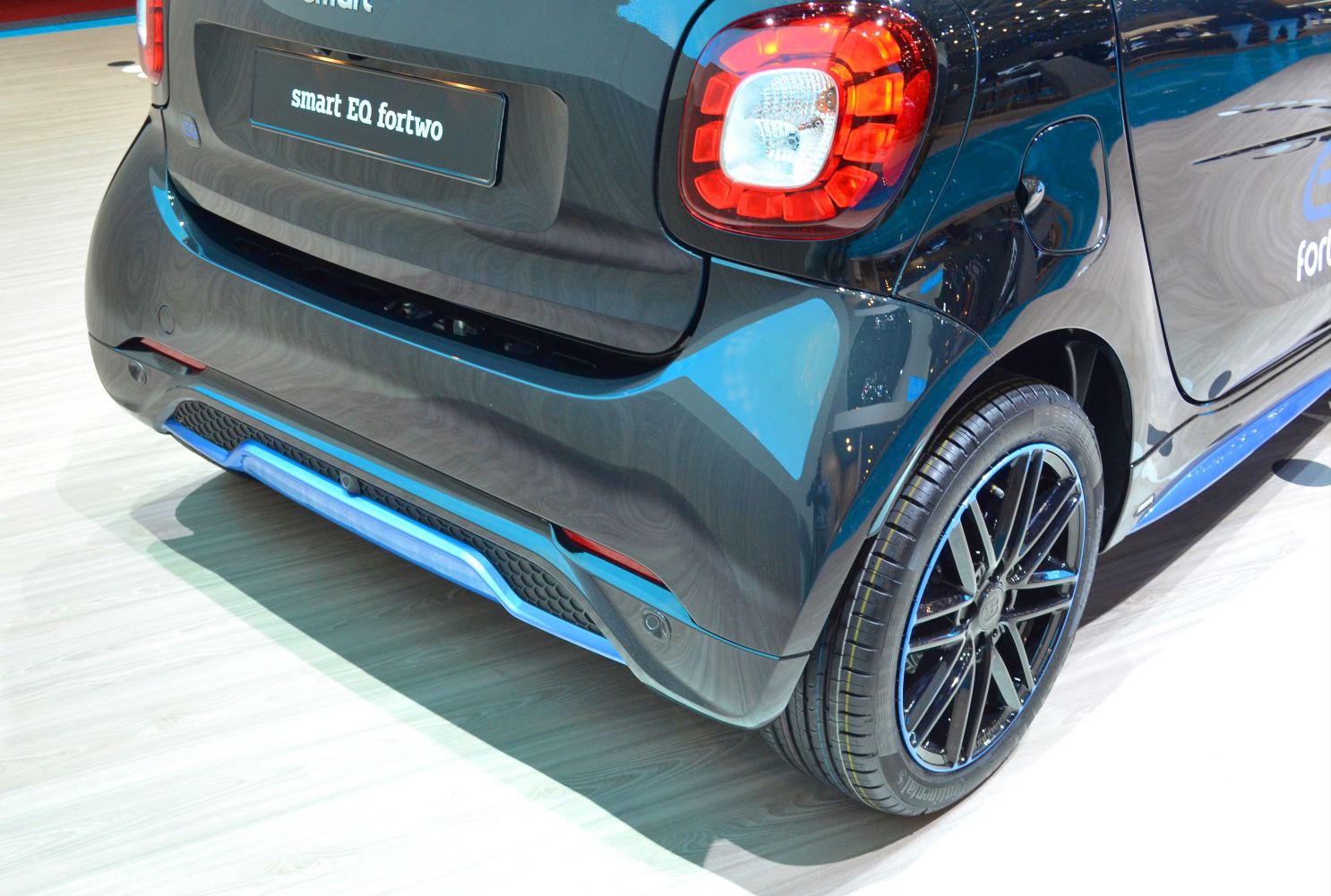 Rear corner with tail light and alloy wheel close-up