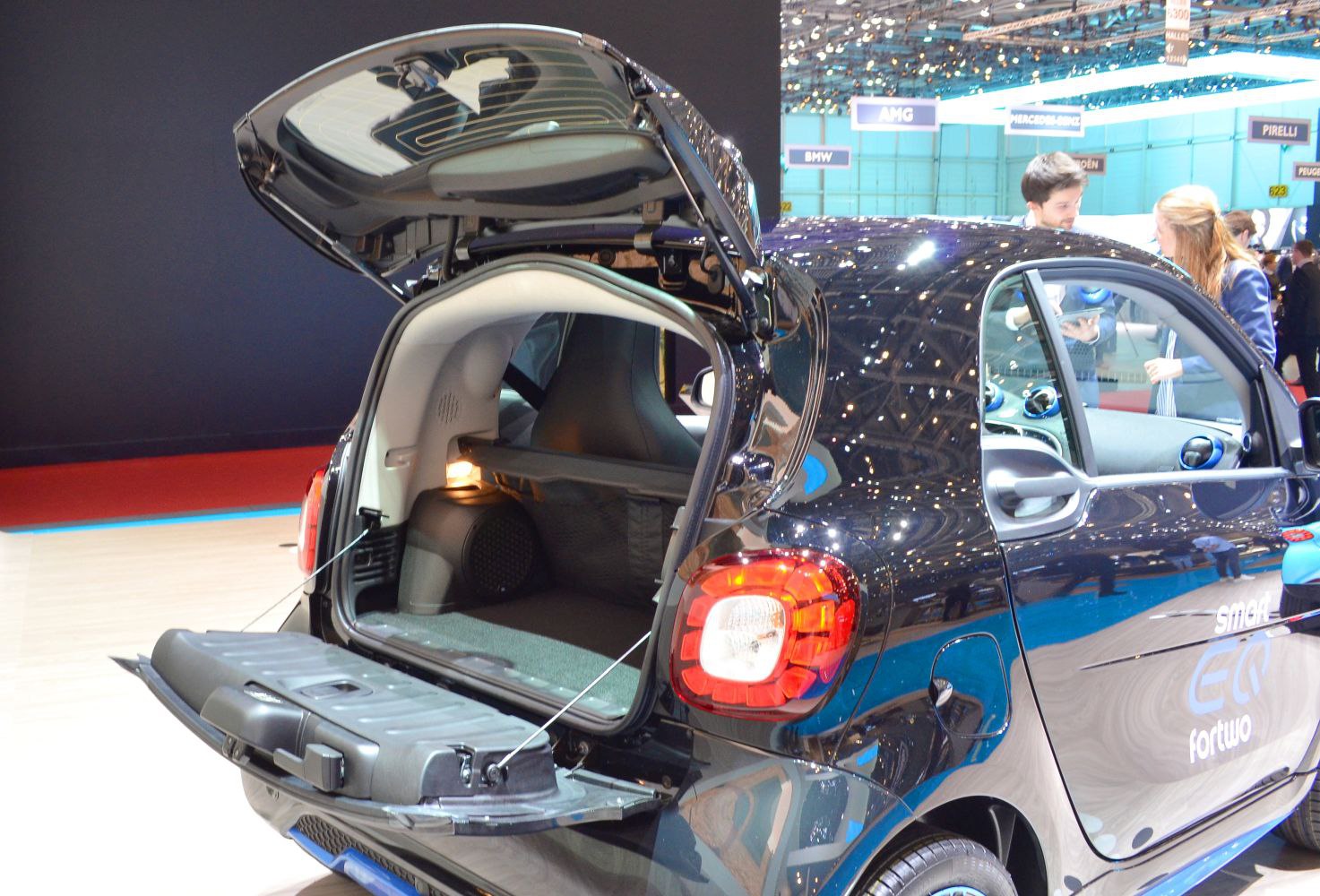 Open trunk and rear light of a compact electric hatchback