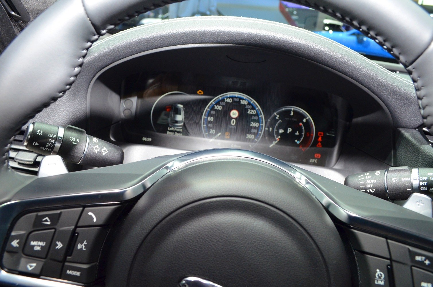 Digital instrument cluster and multifunction steering wheel