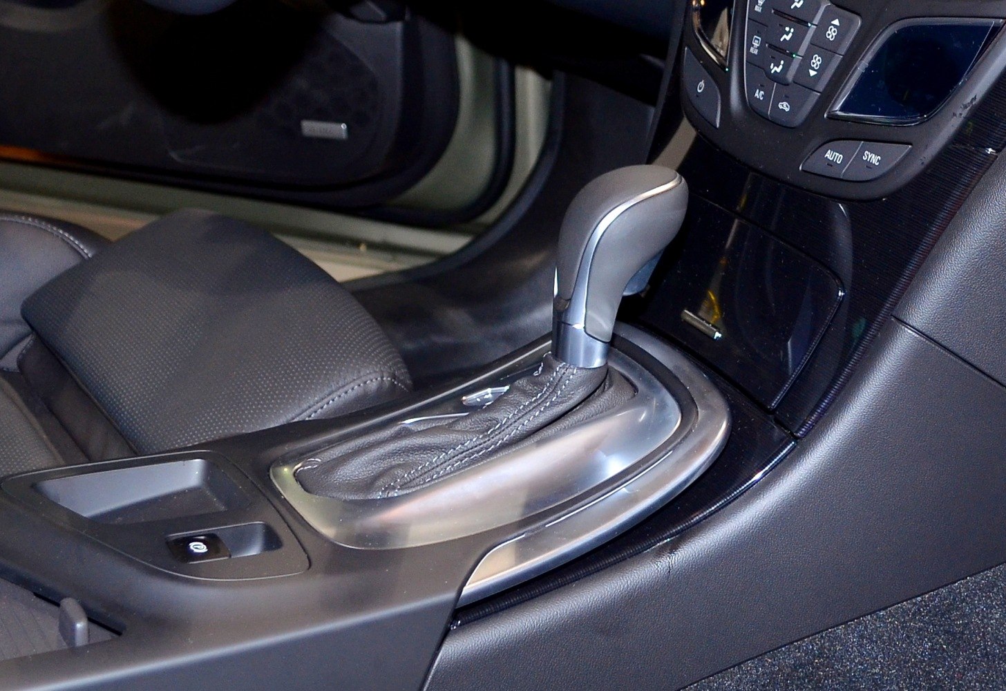 Close-up of automatic gear shift lever and center console