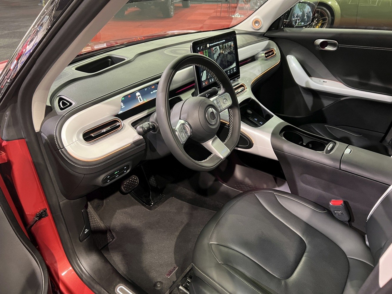 Digital dashboard and touchscreen infotainment in a compact car interior