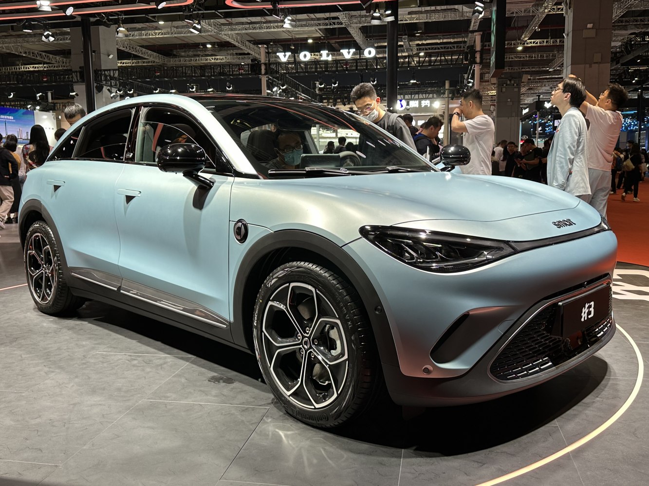 Front-side view of electric SUV with LED headlights and alloy wheels