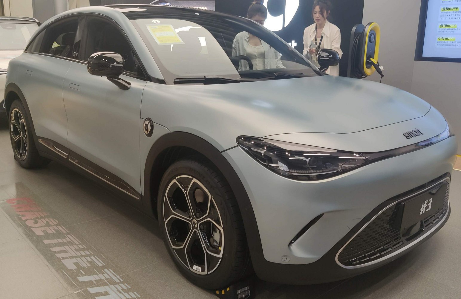 Futuristic electric crossover with LED headlights and aerodynamic body design