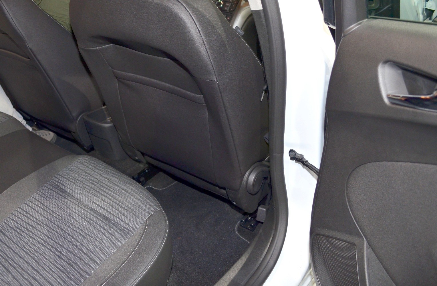 Rear passenger seat and door panel interior of car