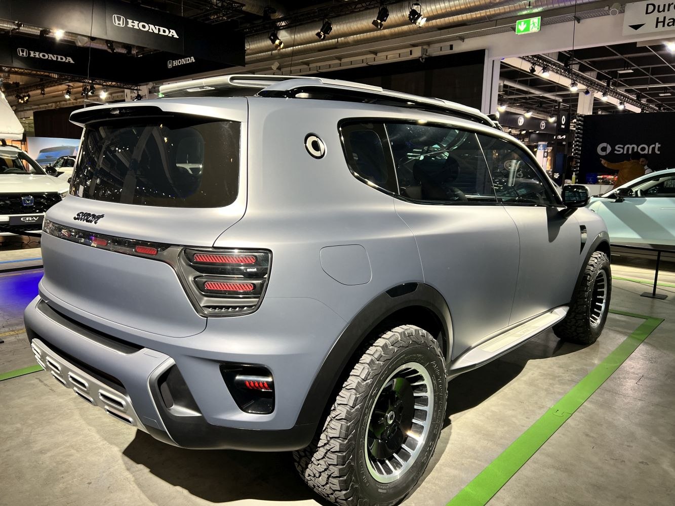 SUV rear view with unique taillights and rugged off-road tires