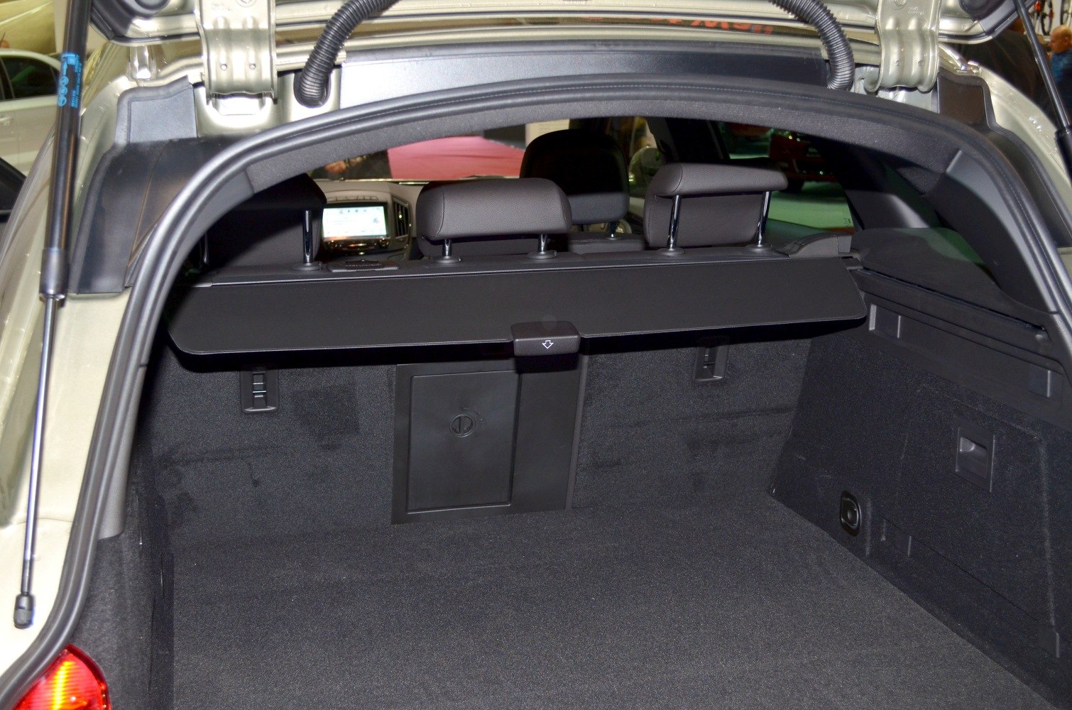 Spacious trunk compartment with rear seatbacks and cargo cover