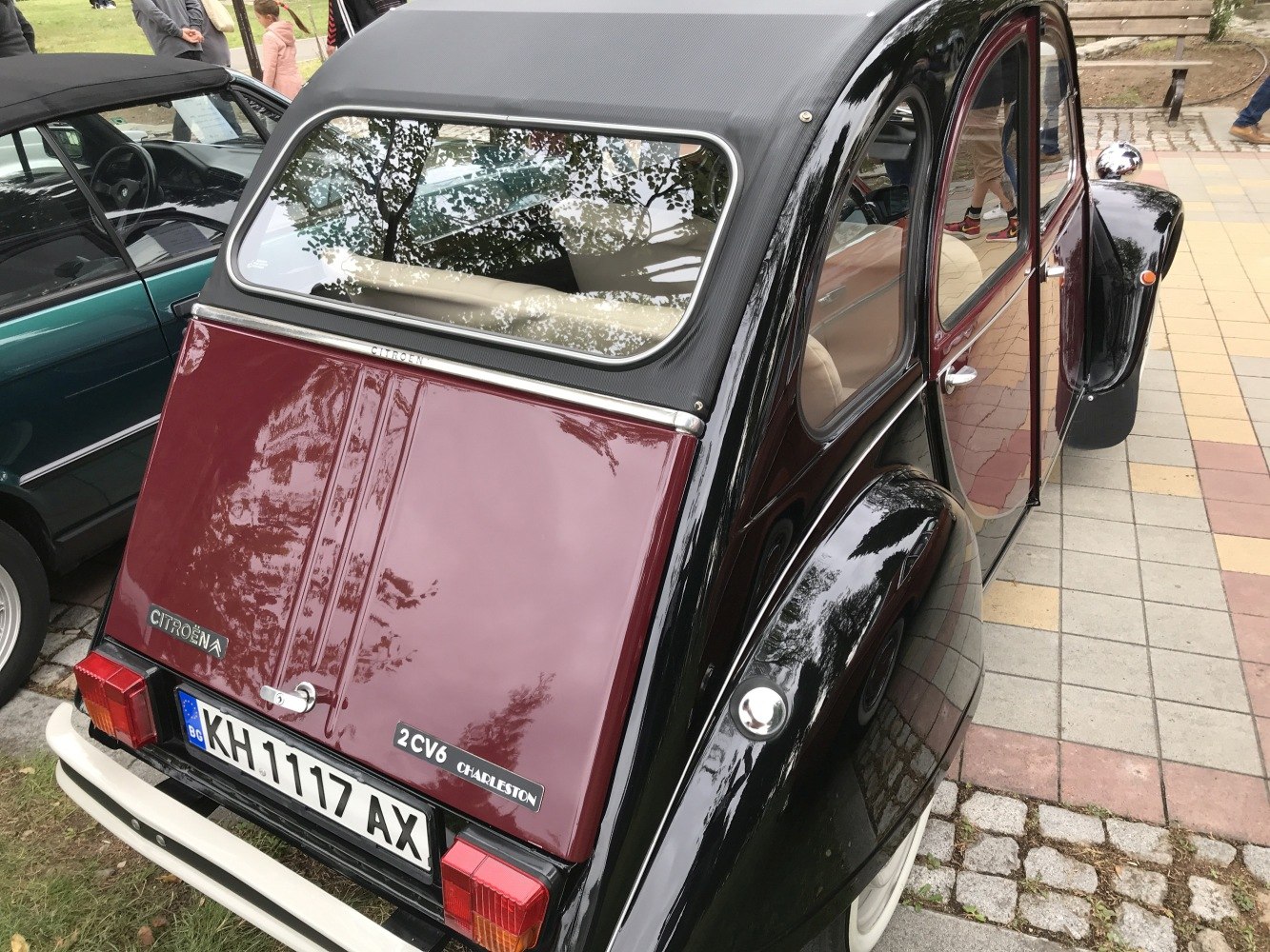 Vintage car with two-tone rear hatch and curved body panels