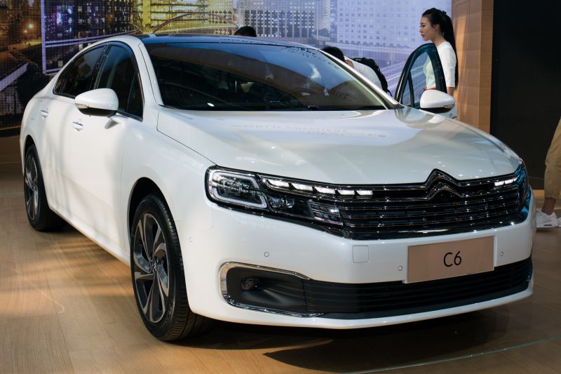 Front grille and LED headlights of a luxury sedan