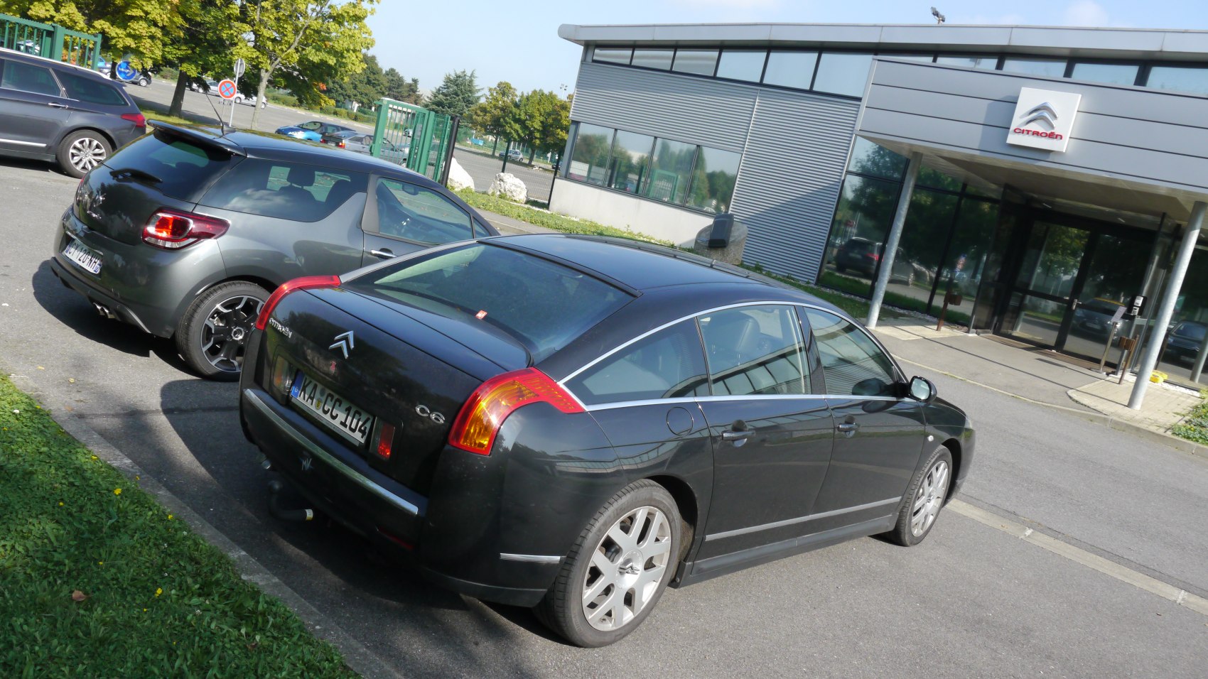 Rear view of a sleek luxury sedan with distinctive tail lights and aerodynamic lines