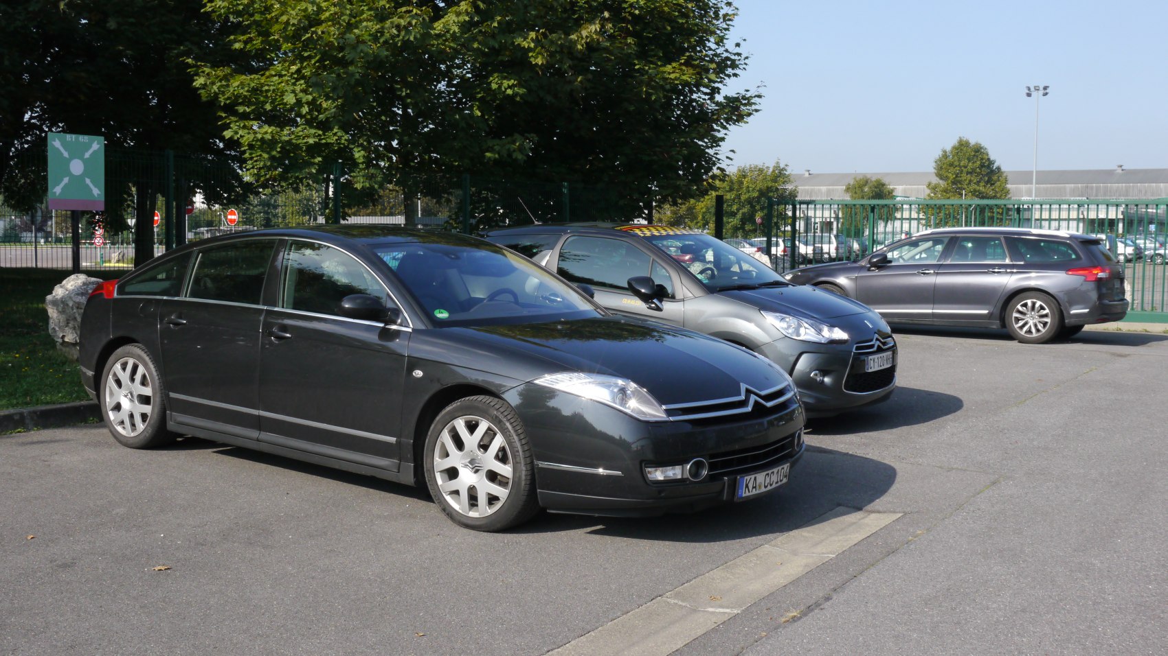 Distinctive black sedan with front grille, headlights, and sleek side profile