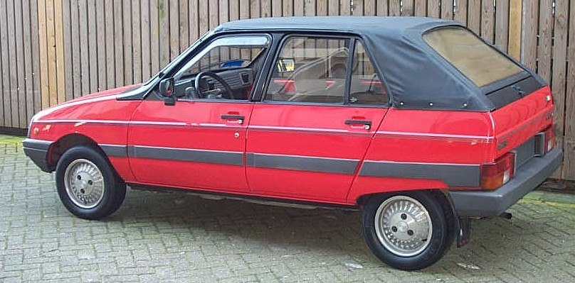 Side profile of compact car with soft convertible roof