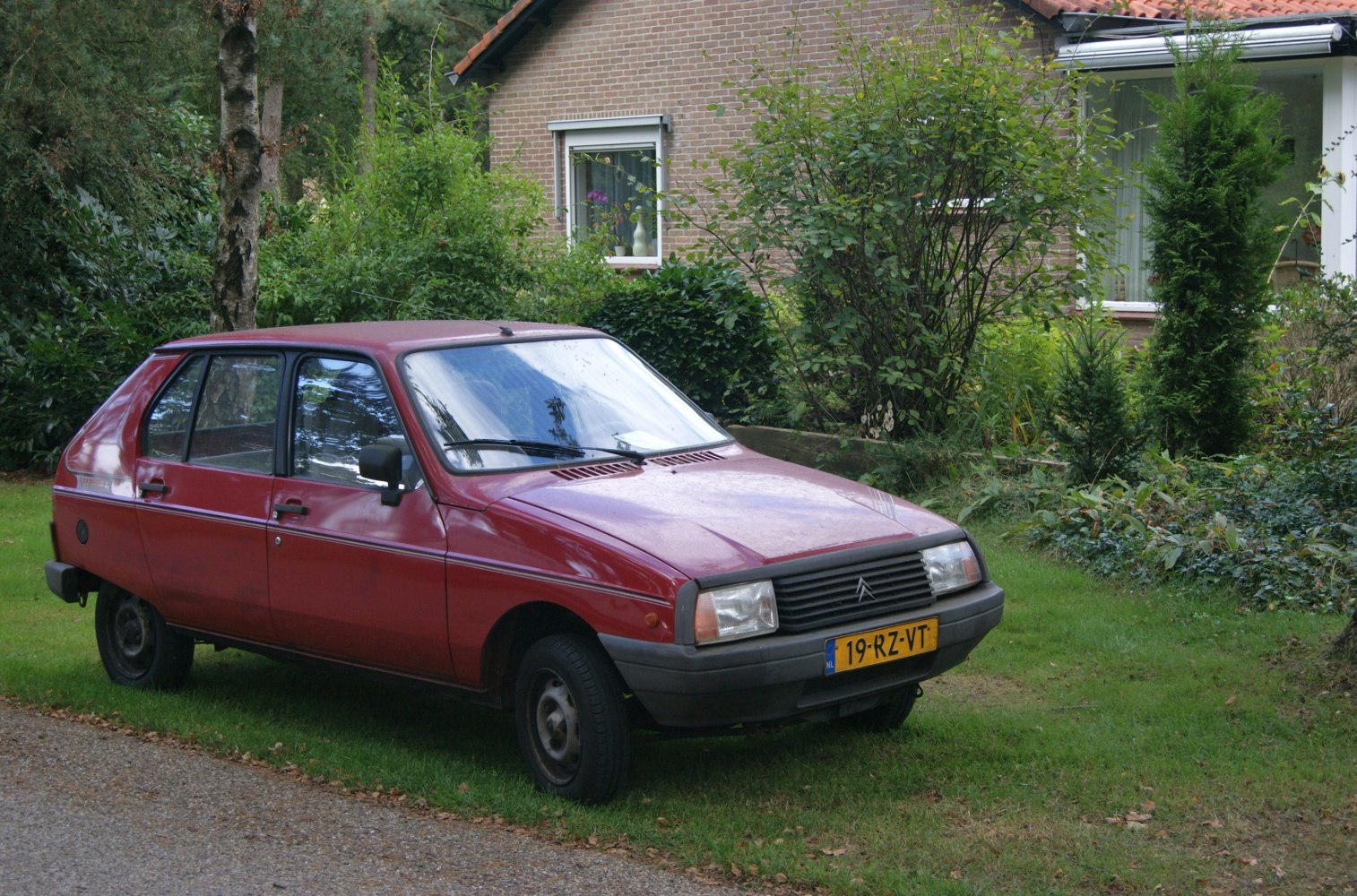 1980s boxy hatchback with rectangular headlights and front grille