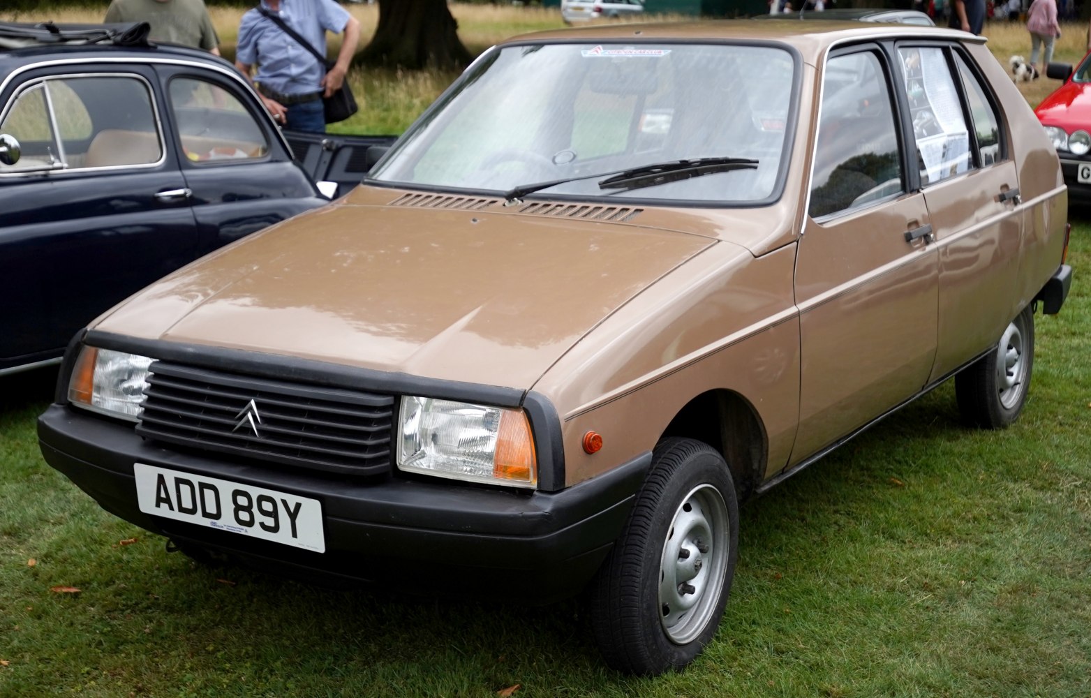1980s compact hatchback with rectangular headlights and black bumper