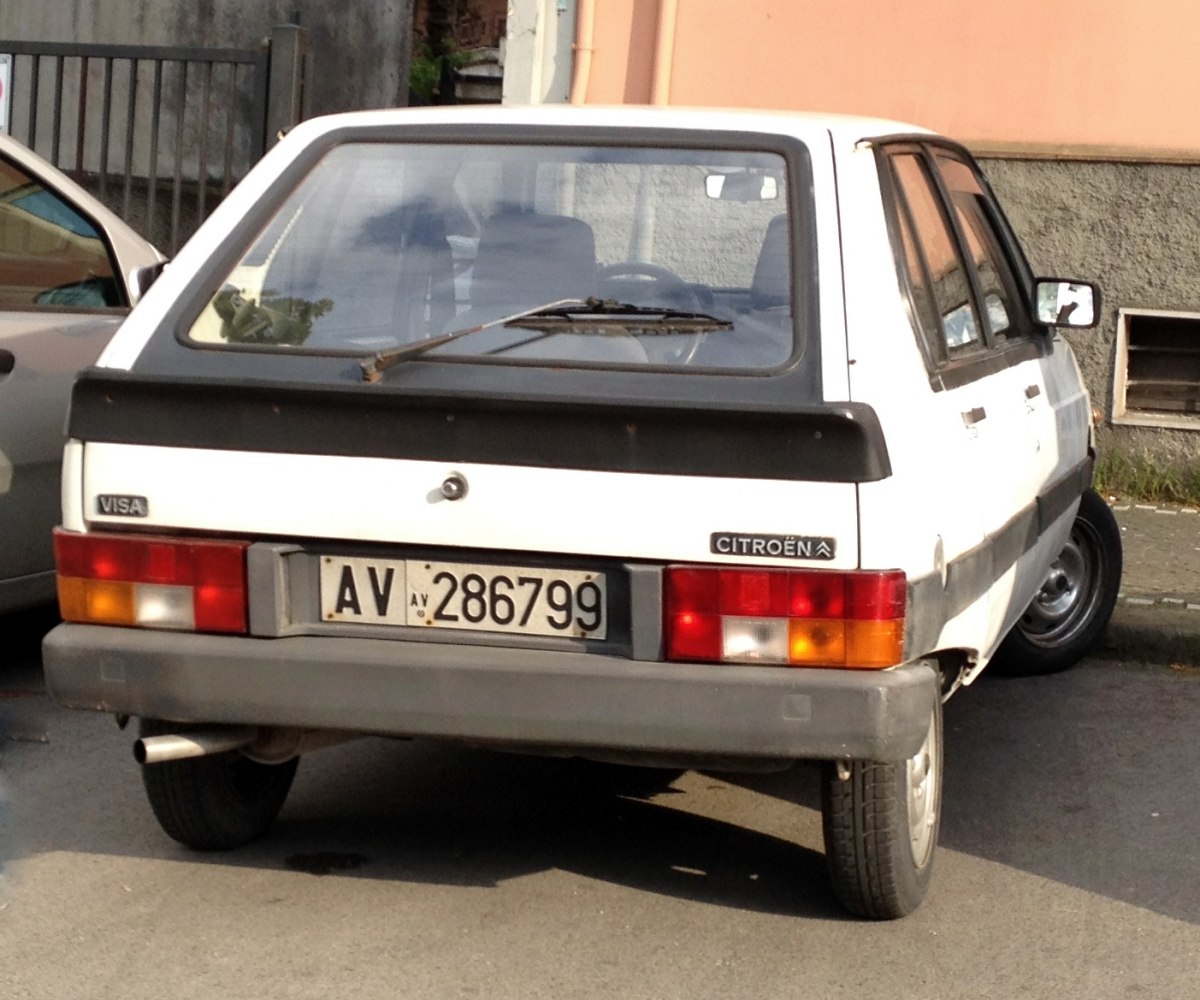 Classic hatchback rear with tail lights and rear window wiper